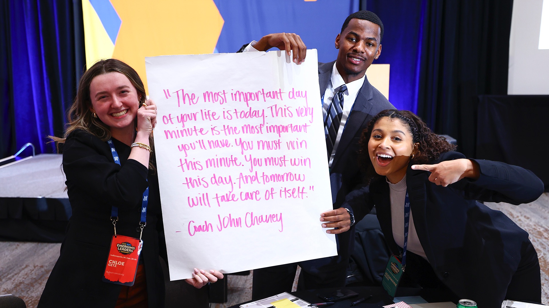 Young professionals at the 2026 Emerging Leaders Seminar show off their work during an activity.