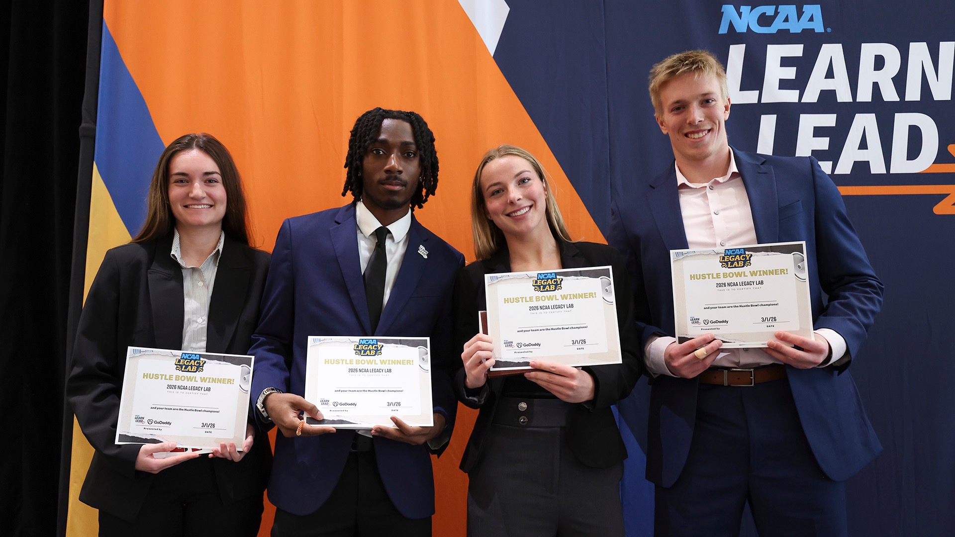 Student-athletes (from left) Quinnipiac's Zoe Bjelac, Marshall's Kylan Overstreet, Wisconsin's Erin Connolly and Indiana's Garrett Messer won The Hustle Bowl, a team challenge to turn concepts into scalable business ideas.