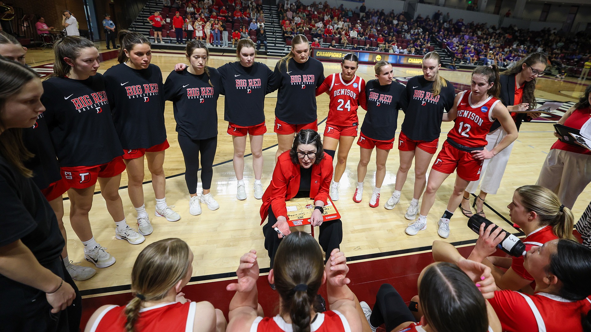 Maureen "Mo" Hirt instructs her team during a timeout in the Division III title game. (Photos by Ryan Hunt / NCAA Photos)