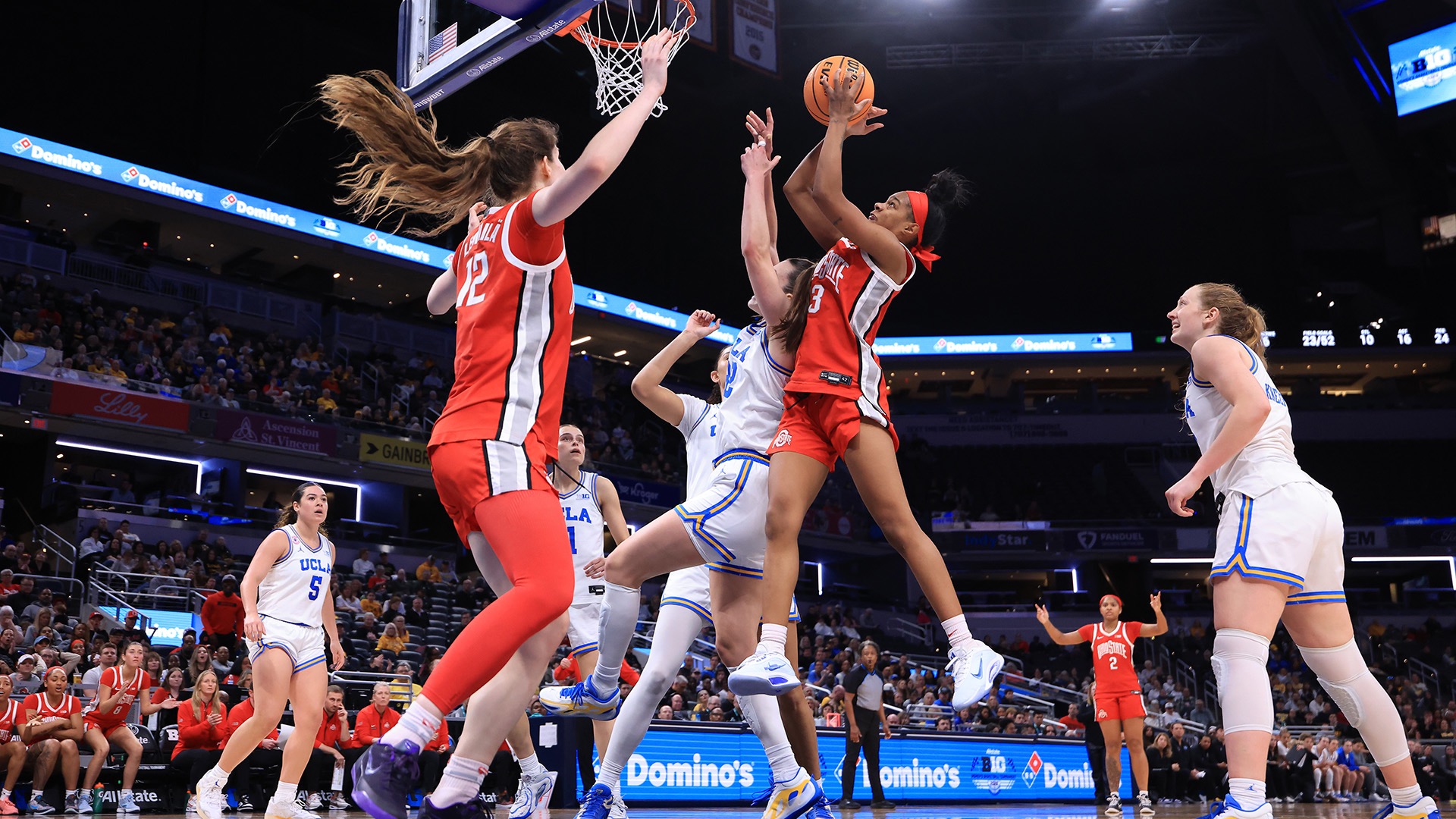 Ohio State's Kennedy Cambridge goes up for a shot against UCLA in the Big Ten women's basketball semifinals. (Photo by Justin Casterline / Getty Images)