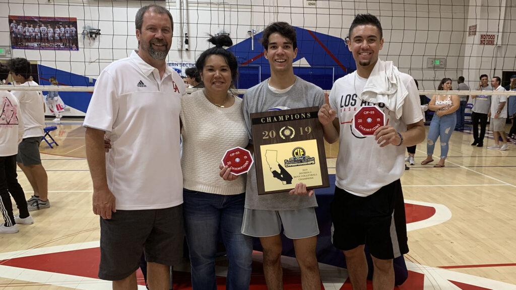 Jordan Lucas shares a moment with his parents and older brother