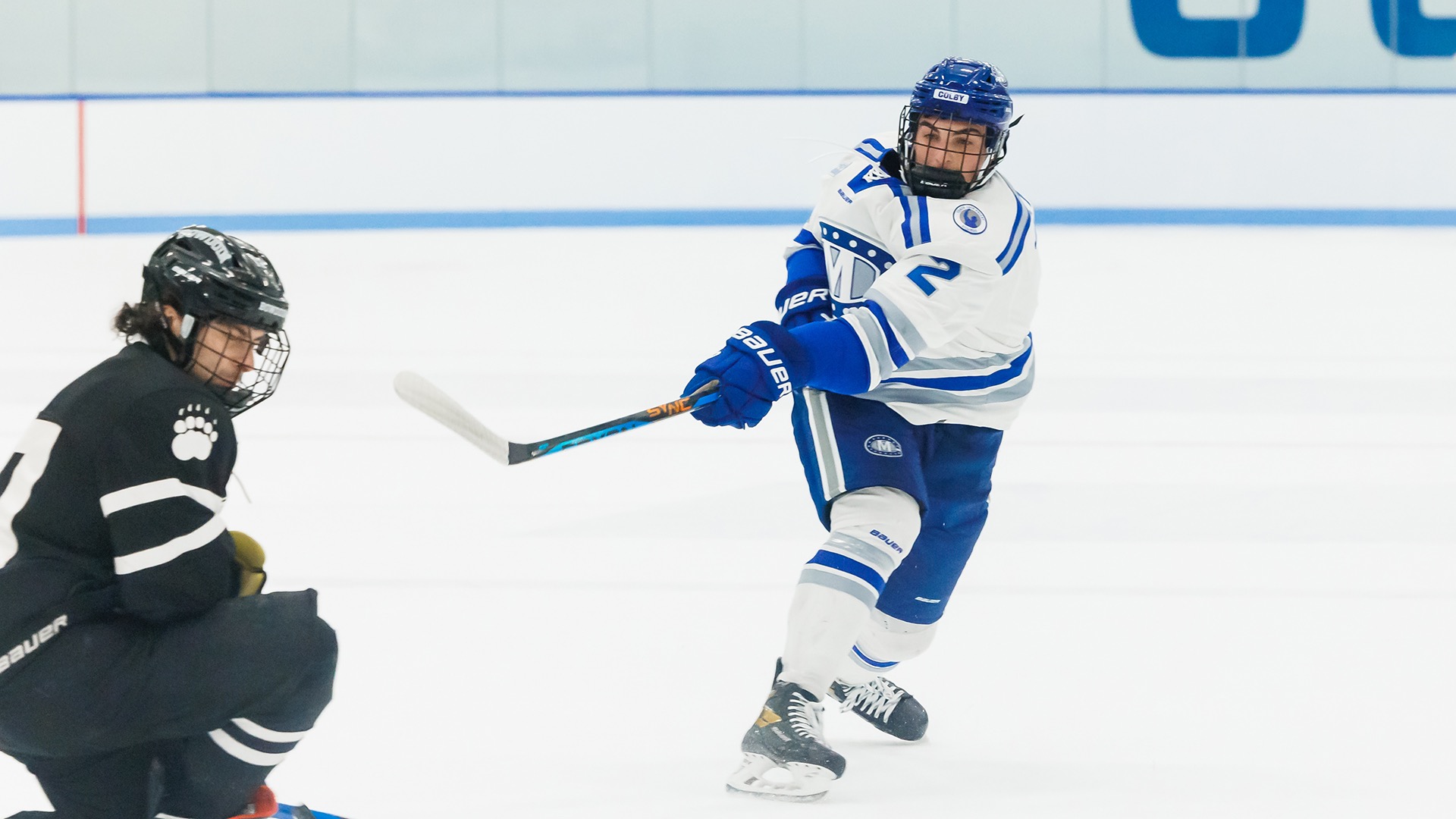 Dan Juzych takes a shot for Colby in a men's hockey game. (Photo courtesy of Colby)