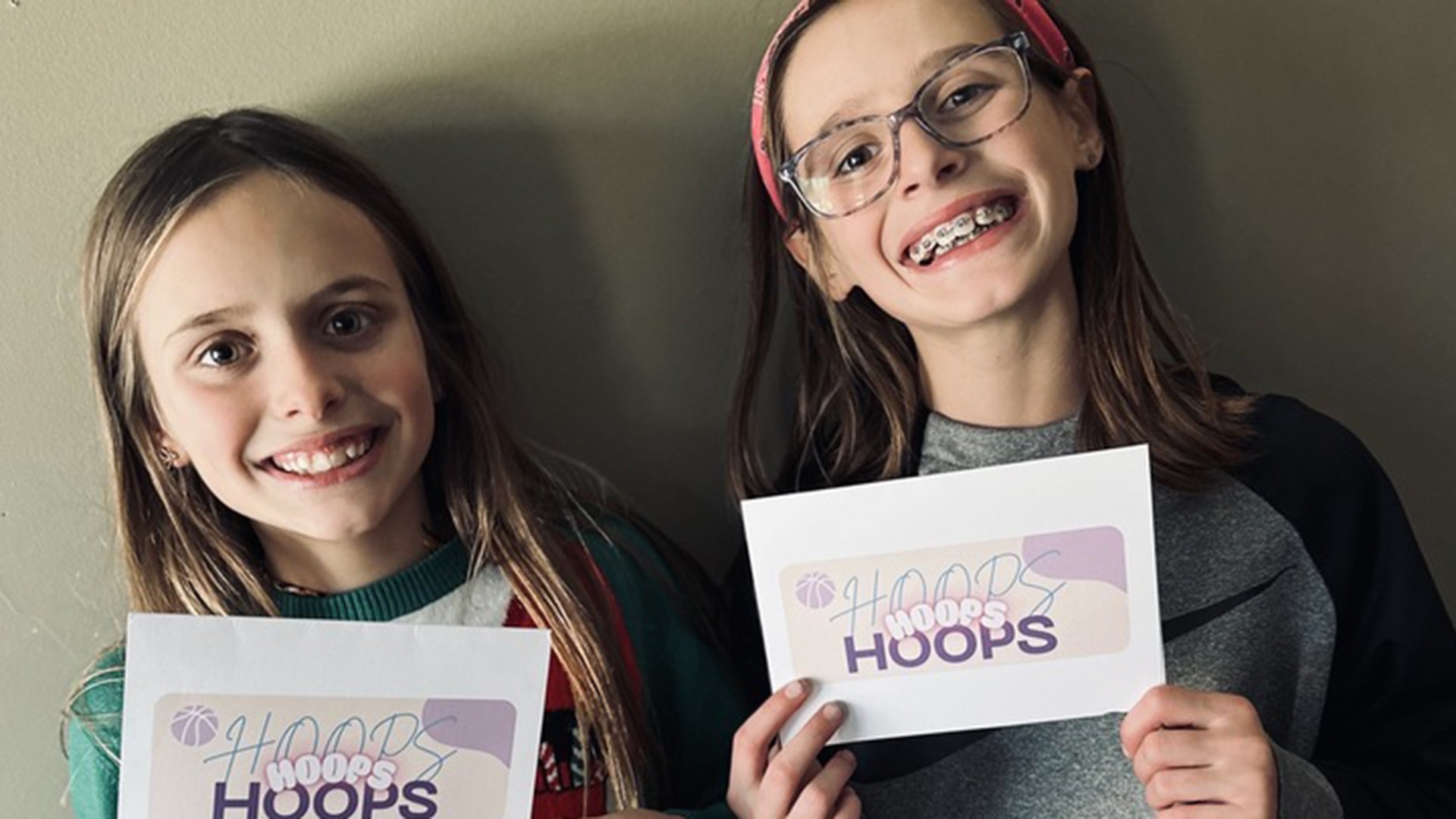 Emery (left) and Braylin (right) with their HOOPS letters. (Photos courtesy of Megan Belke)