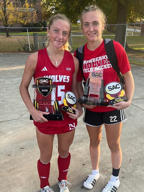 Parker and Payton Heeler display their awards after the South Atlantic Conference tournament. (Photo courtesy of the Keeler family)