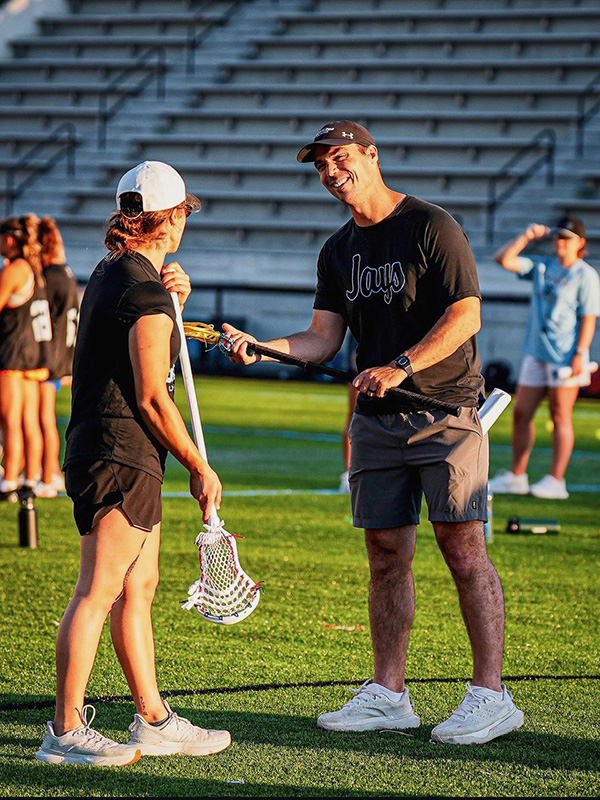 Doucette works with longtime coach and mentor Tim McCormack.