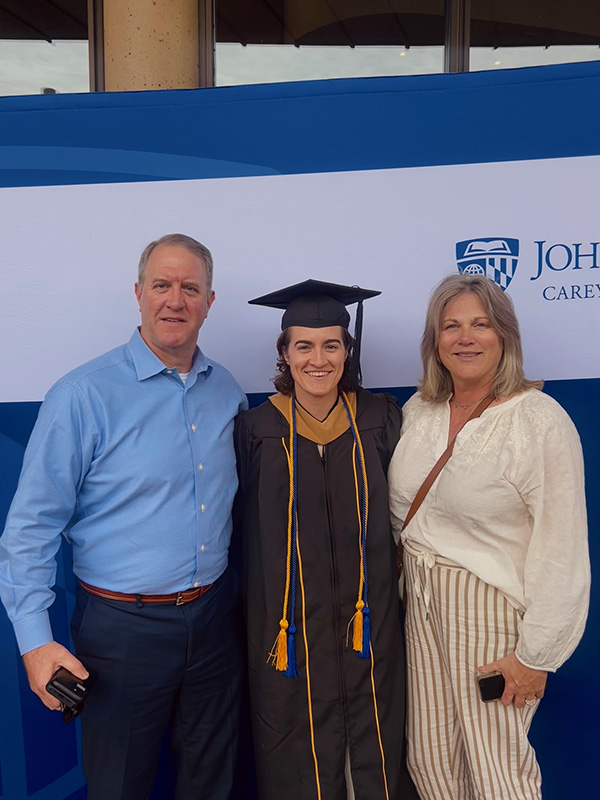 Madison Doucette celebrates her graduation from Johns Hopkins’ Carey Business School with her parents, Gary and Amy. (Photos courtesy of Madison Doucette)
