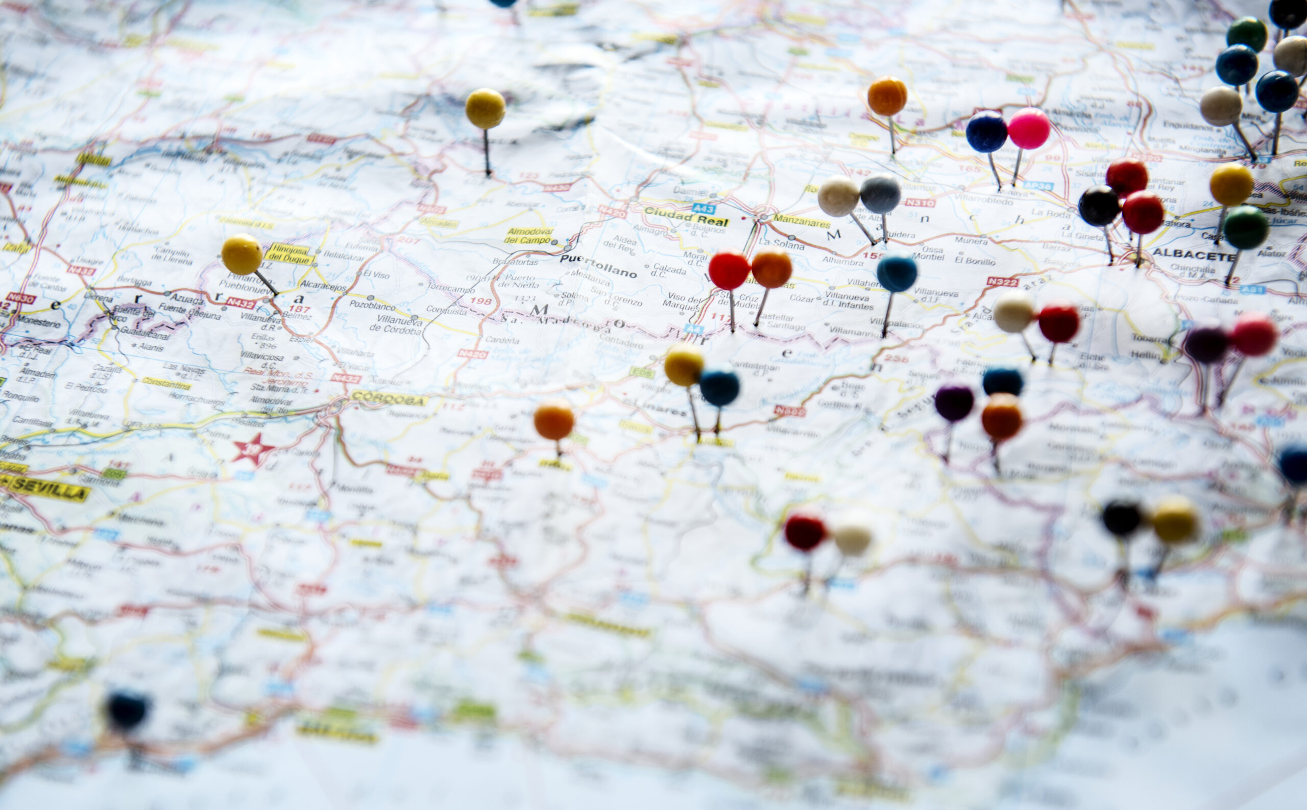 colorful-map-with-pins-indicating-travel-locations