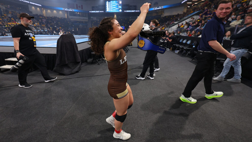 Audrey Jimenez walks off the mats at the 2026 National Collegiate Women’s Wrestling Championships. (Photo by Justin Tafoya / NCAA Photos)