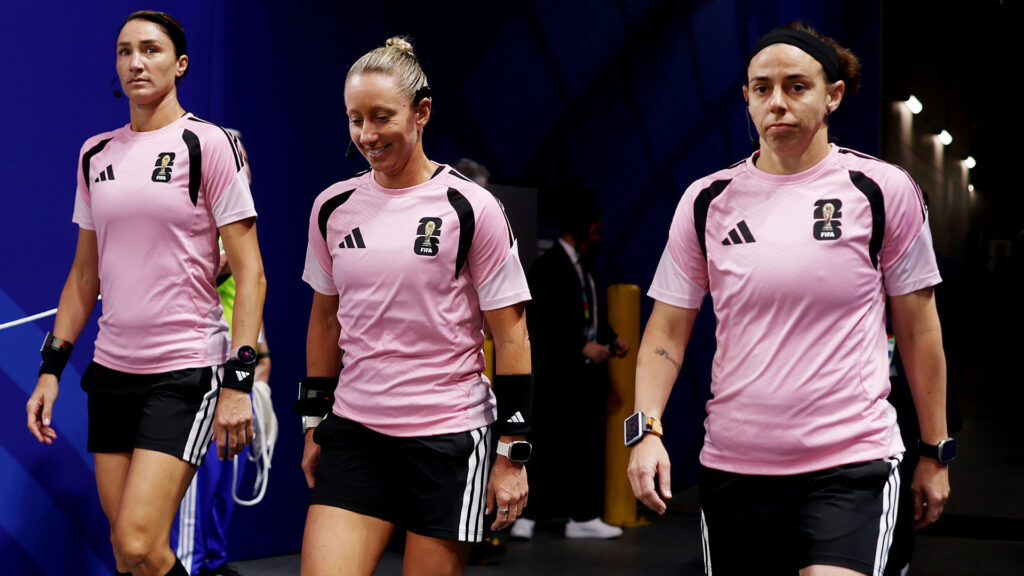 Officials Brooke Mayo (from right), Tori Penso and Kathryn Nesbitt take the field at the 2026 World Cup. (Photo by Lars Baron / Getty Images)