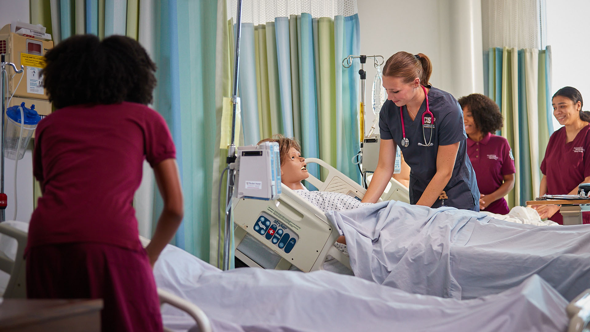 Nold, a nursing major at Concordia-St. Paul, tends to a simulated patient. (Photo by NCAA Division II staff)